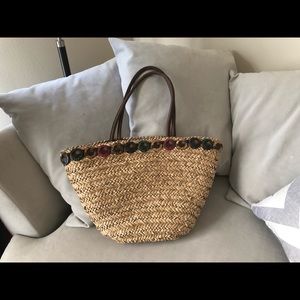 Large straw bag with leather handles